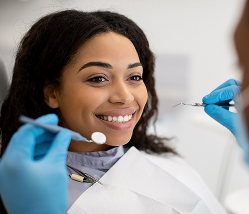 Woman receiving a dental exam