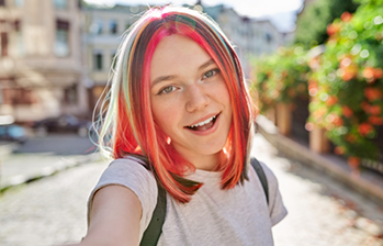 Selfie of a teenage girl with pink and blonde hair