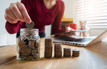 Person counting coins
